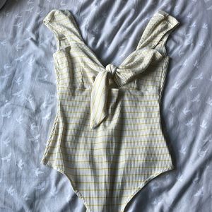 White and Yellow Bodysuit